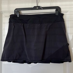 Lululemon black spandex skort with ruffles on back size 10